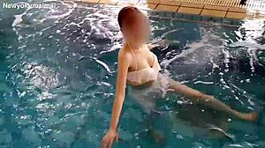 Cute asian student does pool exercises