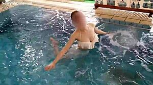 Cute asian student does pool exercises