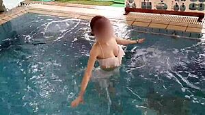 Cute asian student does pool exercises
