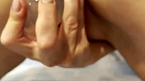 Close-up view of intense solo masturbation leading to powerful orgasm