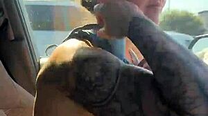 girl fixes sports bra in gym parking