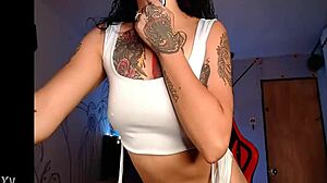 Latina camgirl performs live on camera