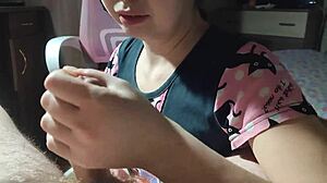 Korean woman massages cock with hands and lips! Cum in mouth!