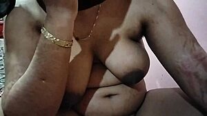 Curvy Indian woman poses with natural assets