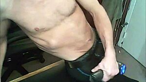 stretching with massage gun in compression tights and brace bound