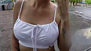 Two beauties cycle without panties in rain