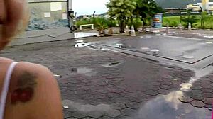 Two beauties cycle without panties in rain