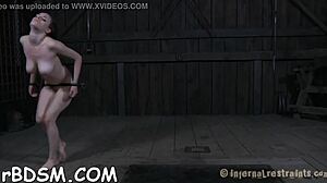 Clamped up beauty receives attention in her private areas