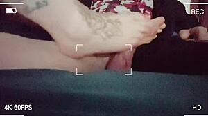 Stroking hubby's friend's big cock with my little feet