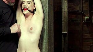 oh, slut in rope bondage getting her ass whipped hard!