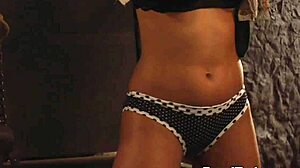 sensual tight lesbian slave moans loudly as madame fingers and kisses her bound body