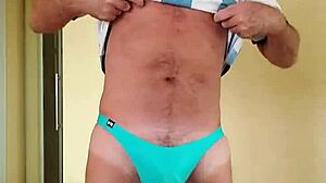 pervy papifachero rubs his bulge in thong to stay warm in snowy argentina