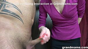 A hot granny rims in the locker room during a cfnm session