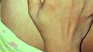 The deshi bhabi was playing with her big boobs at home