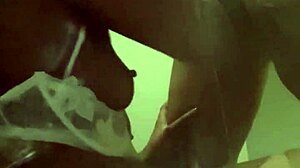 She's sucking that big black cock in front of the fridge, sloppy and deep