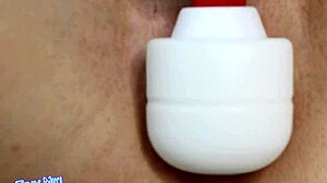 does a hot brunette make herself squirt?