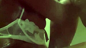 She's sucking that big black cock in front of the fridge, sloppy and deep