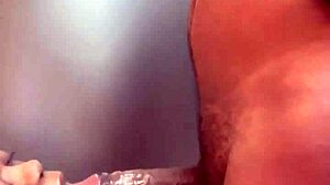 She's sucking that big black cock in front of the fridge, sloppy and deep