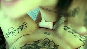 I love these tatooed lesbien goths slipping tongues into soft pussy.