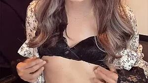 japanese ladyboy masturbates quietly in one-piece dress