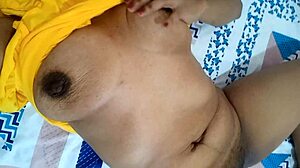 Sexy housewife inserts fingers into her wet pussy for pleasure