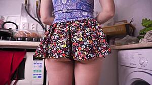 Watch this upskirt voyeur video: Is that hot stepsis cooking without panties?