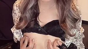 japanese ladyboy masturbates quietly in one-piece dress