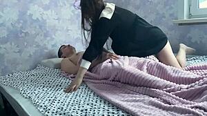 Stepdaughter sneaks into stepfather's bed for intimate encounter