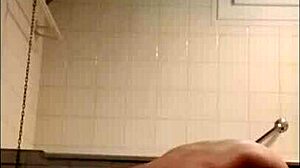 Slave humiliates herself with belt whips.