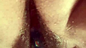 Up close hairy pussy glass dildo masturbation session.