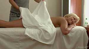 A big-dicked masseur rubs blonde pussy on all fours