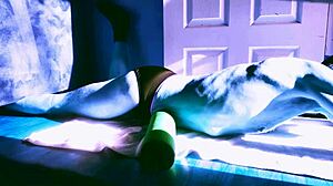 i'm stretching on the floor with my roller in briefs getting some winter sun relief