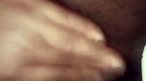 dark juicy folds glisten inviting deep exploration of black pussy depths