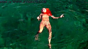 Skinny babe flashes shaved wet pussy by blue water outdoors!