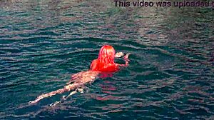 Skinny babe flashes shaved wet pussy by blue water outdoors!