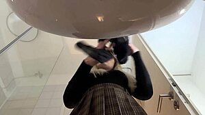 hey check out this big tits blonde in heels and pantyhose stripping her miniskirt off in the bathroom