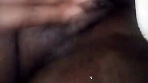 dark juicy folds glisten inviting deep exploration of black pussy depths