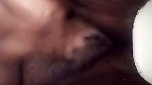 dark juicy folds glisten inviting deep exploration of black pussy depths