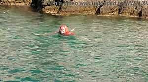 Skinny babe flashes shaved wet pussy by blue water outdoors!