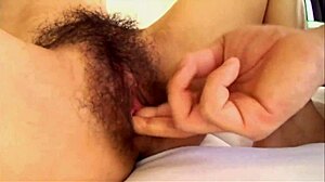 Hairy Japanese amateur teases beaver with toys in bedroom