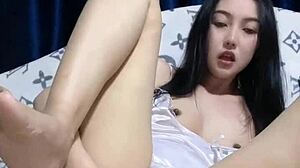 JAPANESE BABE SQUIRTS WILD IN SOLO MASTURBATION FRENZY 03!