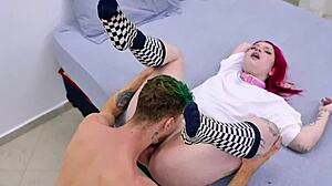 tattooed white girl teases with playful moves in bed