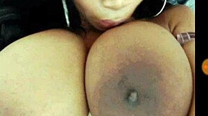 Busty Ebony's Massive Tits Tease Secrets on Webcam