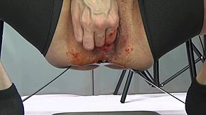 her beautiful big pussy glistens with strawberry close-up