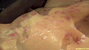 Redhead Bound in Latex Endures Candle Wax on Pussy During Outdoor BDSM Spanking