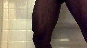 black dude strokes monster cock in homemade shower solo
