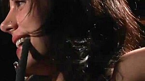 Redhead Bound in Latex Endures Candle Wax on Pussy During Outdoor BDSM Spanking