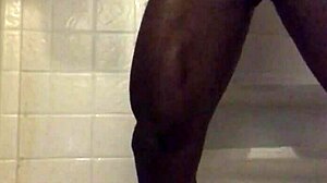 black dude strokes monster cock in homemade shower solo