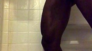 black dude strokes monster cock in homemade shower solo