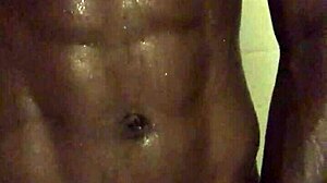 black dude strokes monster cock in homemade shower solo